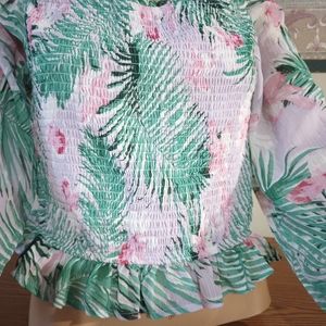 Tropical floral "Revamped" brand top with ruffle long sleeves.  Green and pink.